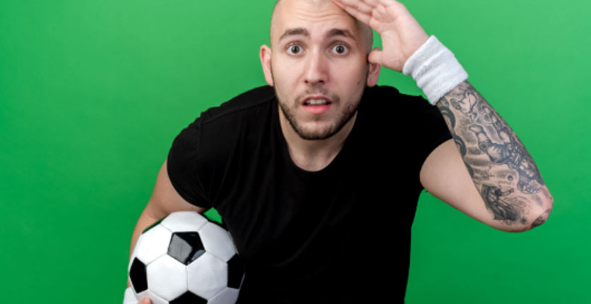 Man holding soccer ball