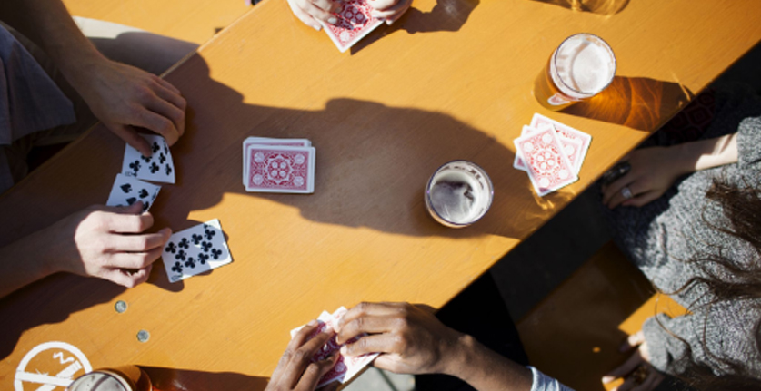 Playing card games and drinking alcohol